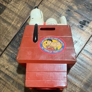 Peanuts Snoopy Red Toy Bank from Chex Mix cereal